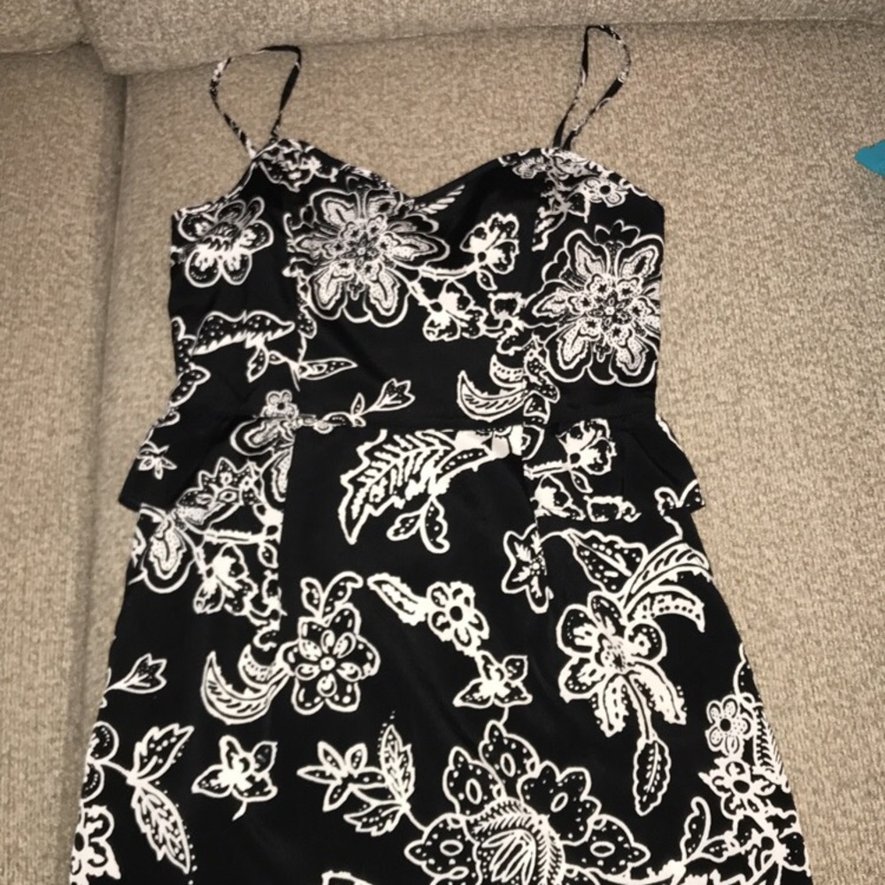 Beautiful black and white peplum dress. NWT